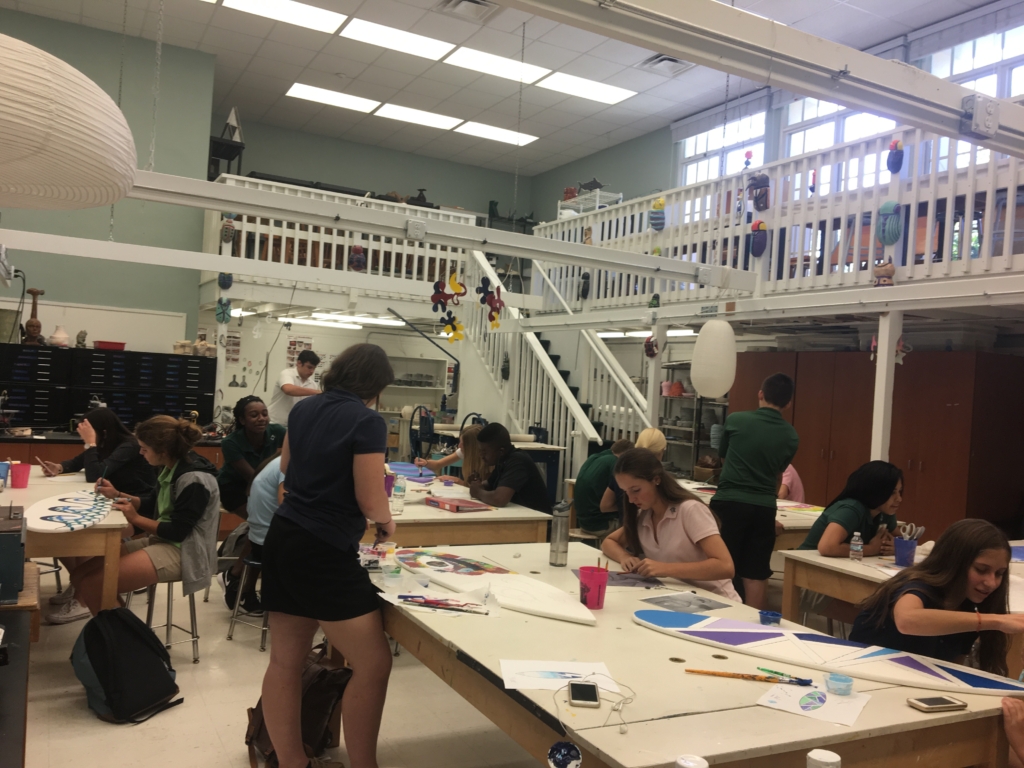 A drawing and painting class working on the "surfboard project." (via, Jessica Gross, freshman) 