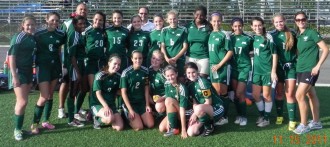 The Girls' Varsity Soccer Team pose for a team photo. (Photo Source: Jasmine Docal)