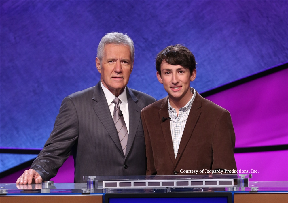 Senior Alan Koolik poses with Jeopardy host Alex Trebek. Photo Credit JEOPARDY Productions, Inc.