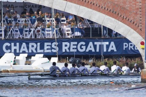 The boys varsity boat maneuvering through a bridge on the Charles. (via Kristen Larson)