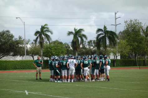 The Pine Crest football team, seen here in the huddle, is ready for the big homecoming game this week. (Photo via Ana Selden/Junior)