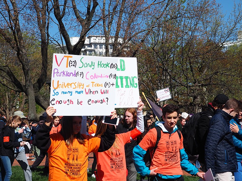 Students display their posters in a Washington, D.C. branch of the National School Walkout.