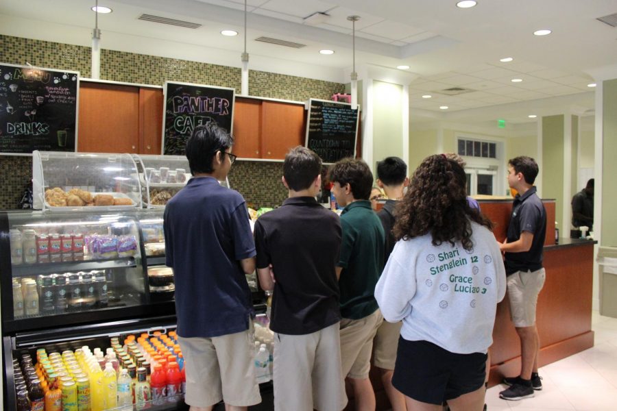 Students wait in line to buy snacks at the Student Union café.