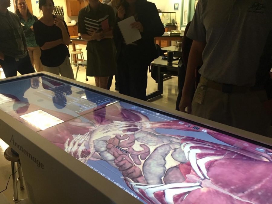 Students use a new cadaver simulation table to learn the intricacies of human biology.