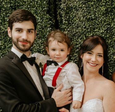 The new Mrs. Ganden poses with her now husband Ian and baby James.