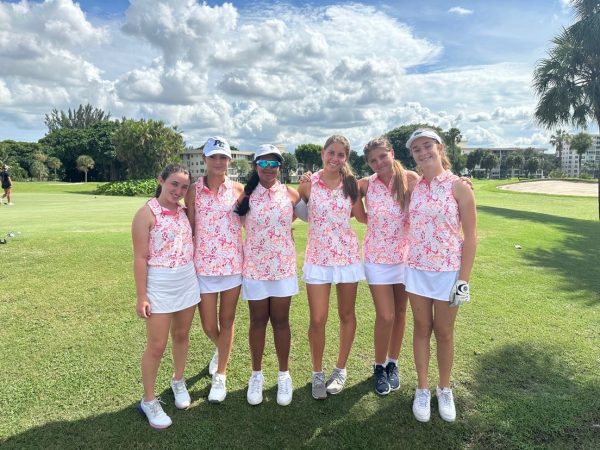 The Pine Crest Girls Varsity Golf team poses after a successful round.