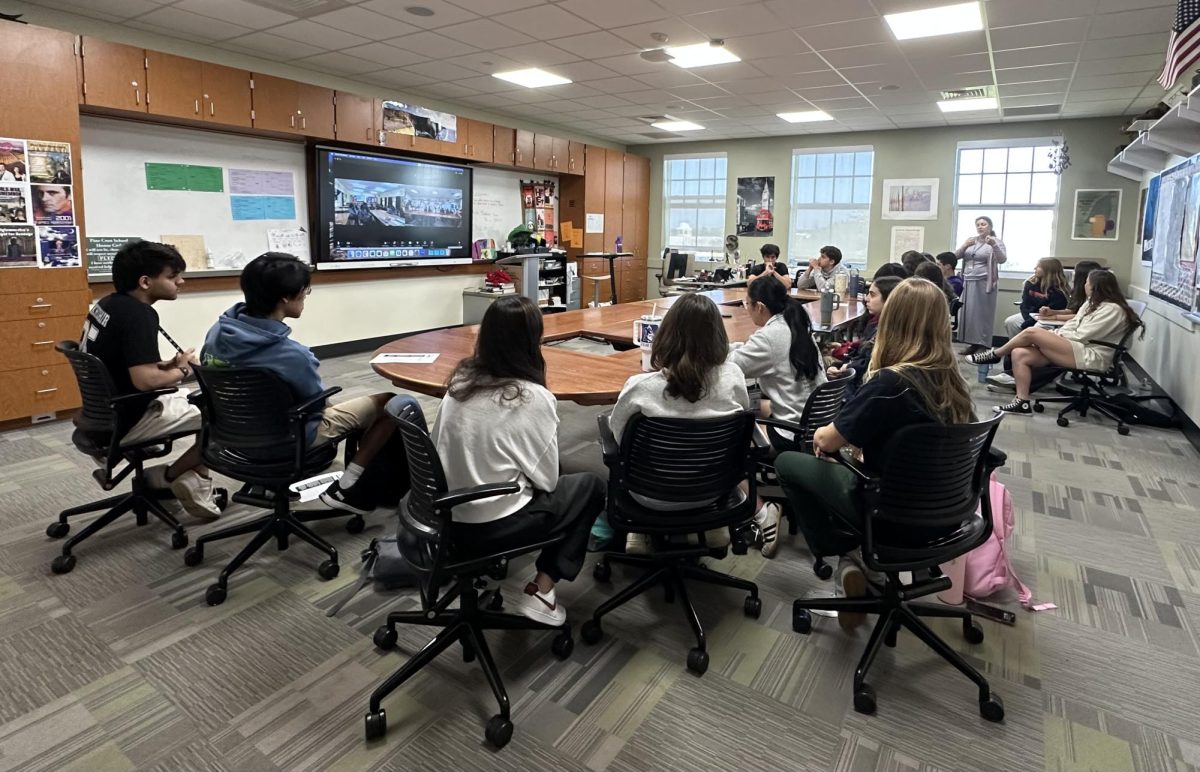 NEHS’ Intercultural Alliance program's first book club meeting was held on March 19, 2025, over Zoom.