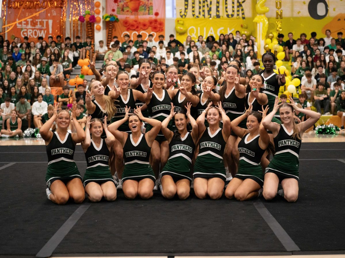 PC cheerleaders perform their pep rally routine.