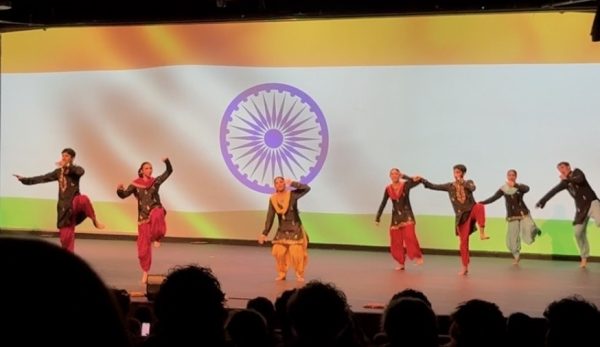 An Upper School Club performs during a performance of the Multicultural Assembly.