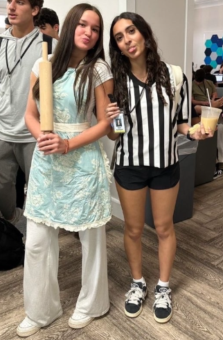 Sara El-Sherif ’27 and Viktoriia (Vika) Miliaieva ’27 pose for a picture during Rhyme Without a Reason dressdown day as ref and chef.
