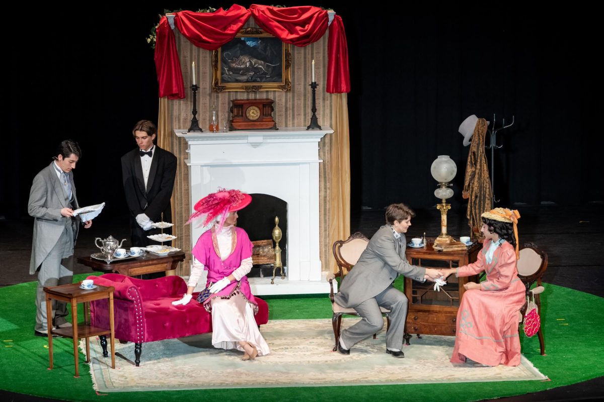Cast members performing in The Importance of Being Earnest.