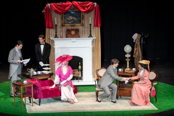 Cast members performing in The Importance of Being Earnest.
